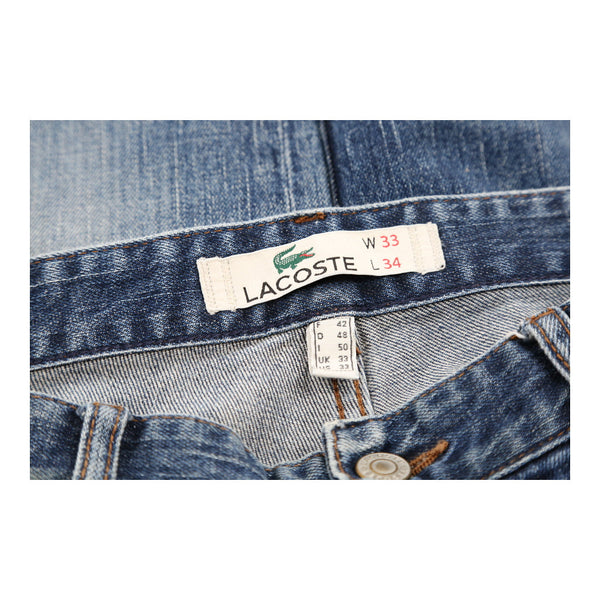 Vintage blue Lacoste Jeans - mens 34" waist