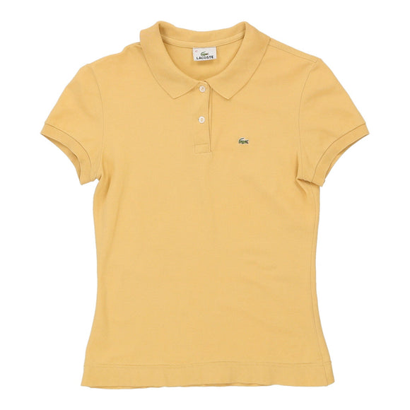 Vintage yellow Lacoste Polo Shirt - womens large