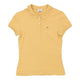 Vintage yellow Lacoste Polo Shirt - womens large