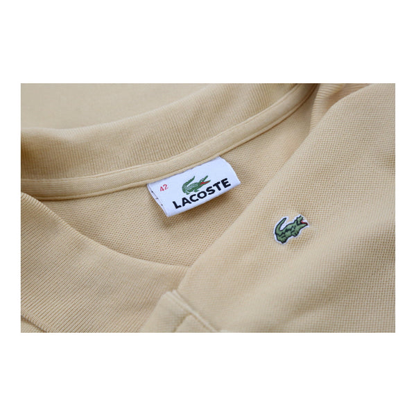 Vintage yellow Lacoste Polo Shirt - womens large