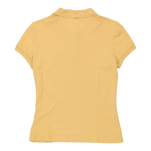 Vintage yellow Lacoste Polo Shirt - womens large