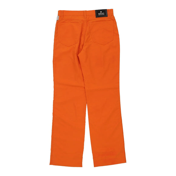 Vintage orange Versace Jeans Couture Trousers - womens 28" waist