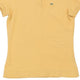 Vintage yellow Lacoste Polo Shirt - womens large