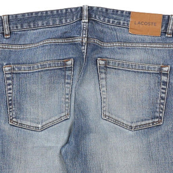 Vintage blue Lacoste Jeans - mens 34" waist