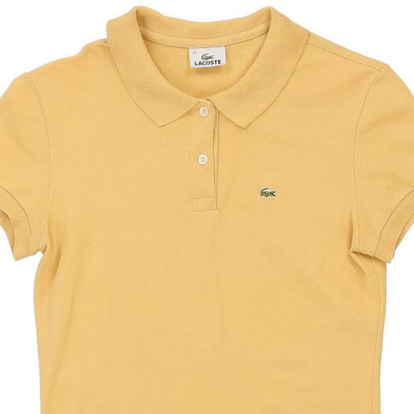 Vintage yellow Lacoste Polo Shirt - womens large